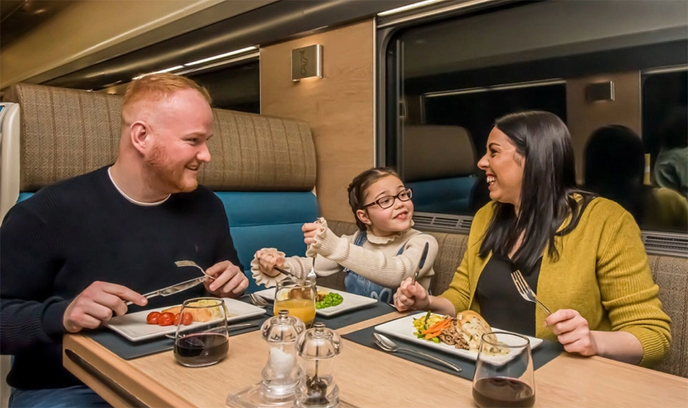 Family eating in Club Car