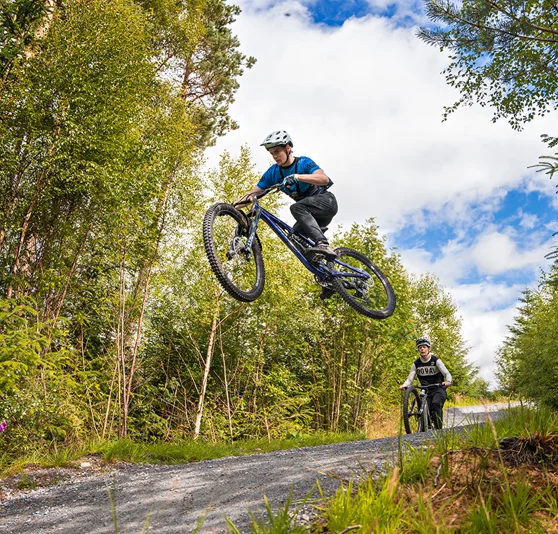 Cyclist jumping on Laggan Wolftrax