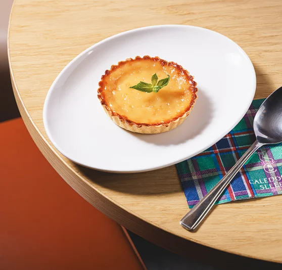 A plate with a portion of Lemon Curd Tart.